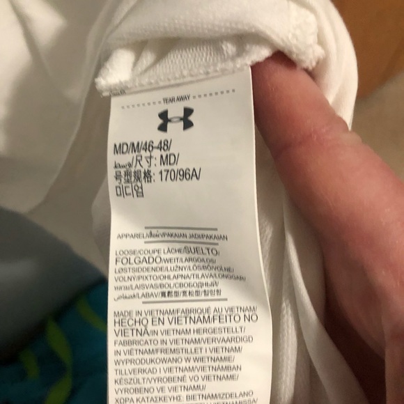 Youth loose fit Under Armour top with good. White color sleeveless. Size medium. - Picture 2 of 3